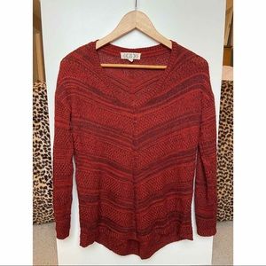 Orange striped sweater